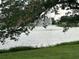 Scenic lake view with a fountain surrounded by lush greenery, creating a tranquil atmosphere at 1200 37Th N St # 403, St Petersburg, FL 33713