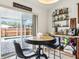 Cozy dining area in kitchen next to a sliding glass door, a breakfast table and beverage center at 12279 Elmore Dr, Spring Hill, FL 34609