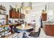 Charming kitchen with island, barstool seating, and modern stainless-steel appliances at 12279 Elmore Dr, Spring Hill, FL 34609