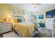 This bedroom offers warm, light yellow colored walls and a bright feel at 12813 Kings Lake Dr, Gibsonton, FL 33534