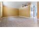Bright living area with tile floors, open layout and neutral wall color at 12813 Kings Lake Dr, Gibsonton, FL 33534