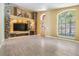 Bright and airy living room with tile floors and an open layout at 12813 Kings Lake Dr, Gibsonton, FL 33534