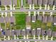 Overhead aerial shot of a residential area showcasing the layout of homes, lawns, and streets at 13603 Wild Ginger St, Riverview, FL 33579