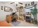 Inviting office with a wooden desk, comfortable chair, and ample storage at 13603 Wild Ginger St, Riverview, FL 33579