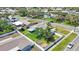 Aerial view of property showcasing fenced yard, mature trees, and neighborhood at 14204 Yacht Club Blvd, Seminole, FL 33776