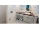 This is a bathroom with a toilet and sink at 14204 Yacht Club Blvd, Seminole, FL 33776