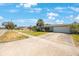 Charming single-story home with a well-manicured lawn and a concrete driveway at 14204 Yacht Club Blvd, Seminole, FL 33776
