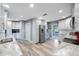 Bright kitchen featuring modern appliances, white cabinets, and granite countertops at 14204 Yacht Club Blvd, Seminole, FL 33776