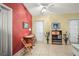 Small dining room with a table set for two, and colorful walls at 1445 Wilson Rd, Clearwater, FL 33755