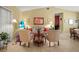 Cozy living room featuring neutral colors, comfortable seating, and ample space for entertaining guests at 1445 Wilson Rd, Clearwater, FL 33755
