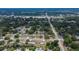 The aerial view looks out on the community and highlights the position of the property within the neighborhood at 1607 Melodie Dr, Brandon, FL 33510