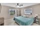 Bedroom with a ceiling fan and view to the outside at 1607 Melodie Dr, Brandon, FL 33510