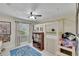 Bedroom with a unique loft bed setup and plenty of play space at 1607 Melodie Dr, Brandon, FL 33510
