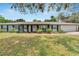 Charming single-story home featuring a well-maintained lawn at 1607 Melodie Dr, Brandon, FL 33510