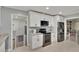 Modern kitchen with stainless steel appliances and granite counters offers easy access to other rooms at 1607 Melodie Dr, Brandon, FL 33510