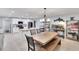 Eat in kitchen featuring stainless steel appliances, a center island, and custom lighting at 1607 Melodie Dr, Brandon, FL 33510