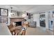 Comfortable living room showcases a fireplace and sliding doors to the outdoors at 1607 Melodie Dr, Brandon, FL 33510