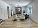 Cozy living room features a modern fireplace, neutral décor, and ample natural light at 16206 Nottingham Park Way, Tampa, FL 33647