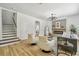 Living room with fireplace and stairs at 16206 Nottingham Park Way, Tampa, FL 33647