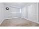 Neutral bedroom offers a serene space, featuring a window and practical closet storage at 2002 Waikiki Way, Tampa, FL 33619