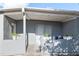 Charming patio with sliding glass door and peaceful backyard view at 2002 Waikiki Way, Tampa, FL 33619