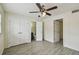 Bedroom with ceiling fan, closet and ensuite bathroom at 208 Danube Ave # 101, Tampa, FL 33606