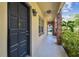 Inviting condo front door with unit number 101, brick columns and updated wall paint at 208 Danube Ave # 101, Tampa, FL 33606