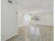 Spacious living room with light-filled natural light and tiled floors at 208 Danube Ave # 101, Tampa, FL 33606