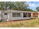 Home with a large backyard with ample space for activities and gardening at 2222 Euclid N Cir, Clearwater, FL 33764