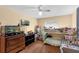 Bedroom featuring a ceiling fan, bunk bed, dresser, aquarium, and other furniture at 2222 Euclid N Cir, Clearwater, FL 33764