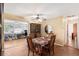 Formal dining room boasts an adjacent den or office space and classic furnishings at 2222 Euclid N Cir, Clearwater, FL 33764