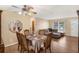 Open-concept dining area flows into the living room for easy entertaining and relaxation at 2222 Euclid N Cir, Clearwater, FL 33764