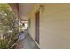 Front porch area providing covered entry to the house at 2724 W Henry Ave, Tampa, FL 33614