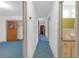 Hallway view from a bedroom to a bathroom, ready for customization at 2724 W Henry Ave, Tampa, FL 33614