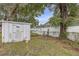 Backyard featuring a storage shed and swing set at 2724 W Henry Ave, Tampa, FL 33614