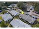 Villa with lush landscaping, carports, and mature trees in a desirable community at 2749 Countryside Blvd # 4, Clearwater, FL 33761