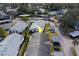 Aerial view of a well-maintained villa featuring a private carport and landscaped surroundings at 2749 Countryside Blvd # 4, Clearwater, FL 33761