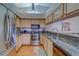 Bright kitchen with stainless steel appliances and granite countertops at 2749 Countryside Blvd # 4, Clearwater, FL 33761