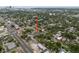 An aerial view indicates a home's location within a leafy neighborhood, marked by a prominent red arrow at 2859 Dartmouth N Ave, St Petersburg, FL 33713