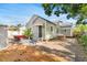 Charming home with a private backyard patio, landscaped with mature trees providing ample shade at 2859 Dartmouth N Ave, St Petersburg, FL 33713