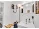 Bright bathroom showcases a sleek vanity, modern mirror, and fixtures, blending style and functionality at 2859 Dartmouth N Ave, St Petersburg, FL 33713