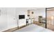 Stylish bedroom features a flat screen TV and breakfast bar with seating, blending comfort with modern living at 2859 Dartmouth N Ave, St Petersburg, FL 33713