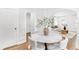 Cozy dining room with a marble table, seating for four, and an open view to the living area at 2859 Dartmouth N Ave, St Petersburg, FL 33713