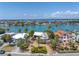 Desirable waterfront home featuring lush landscaping and city views in a vibrant and picturesque coastal community at 31 Dolphin Dr, Treasure Island, FL 33706