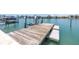 This property boasts a private dock for easy access to the water and waterfront enjoyment at 31 Dolphin Dr, Treasure Island, FL 33706
