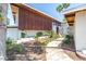 Home featuring a meticulously landscaped front yard and a stone walkway leading to the entrance at 31 Dolphin Dr, Treasure Island, FL 33706