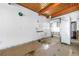 View of kitchen with white walls, wooden ceilings, and vintage refrigerator at 31 Dolphin Dr, Treasure Island, FL 33706