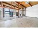 View of living room featuring a fireplace, expansive windows, and wooden ceiling at 31 Dolphin Dr, Treasure Island, FL 33706