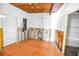 Picture of a room undergoing renovation, displaying exposed wiring, and wooden ceiling at 31 Dolphin Dr, Treasure Island, FL 33706