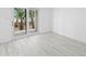 Bedroom with tile floors and sliding glass doors providing natural light and outdoor access at 3102 W Horatio St # 13, Tampa, FL 33609